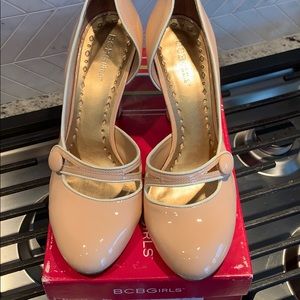 BCBGirls nude/bone button pumps